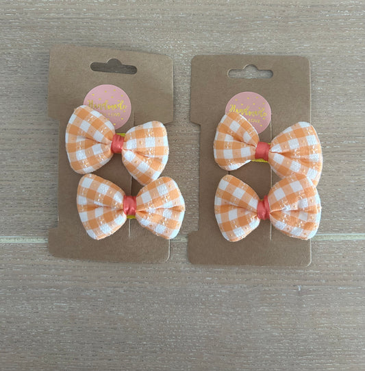 Orange and white bows