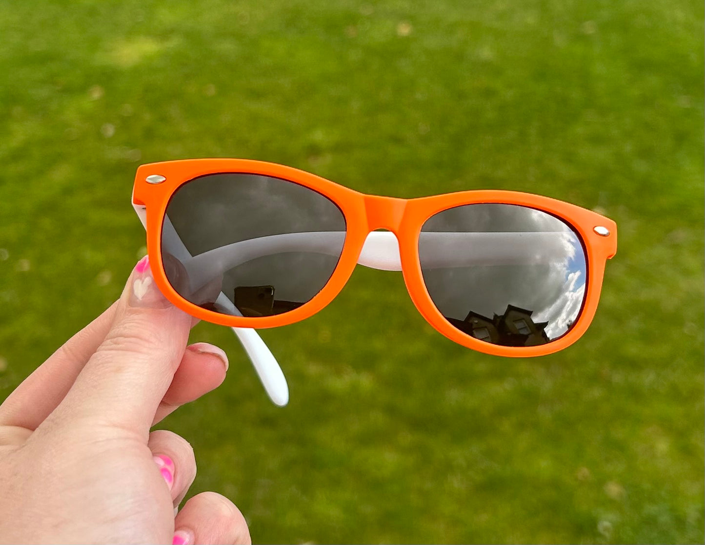 Orange and white polarised sun glasses